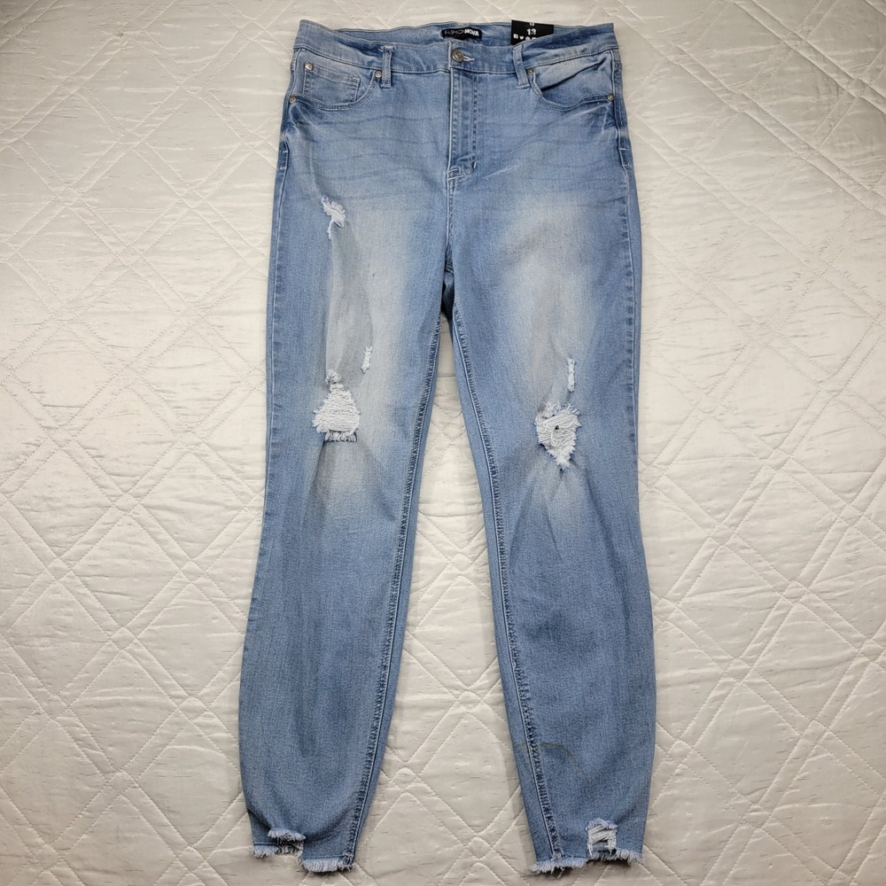 Fashion Nova Raw Hem Distressed blue jeans size 13/31 nwt‎